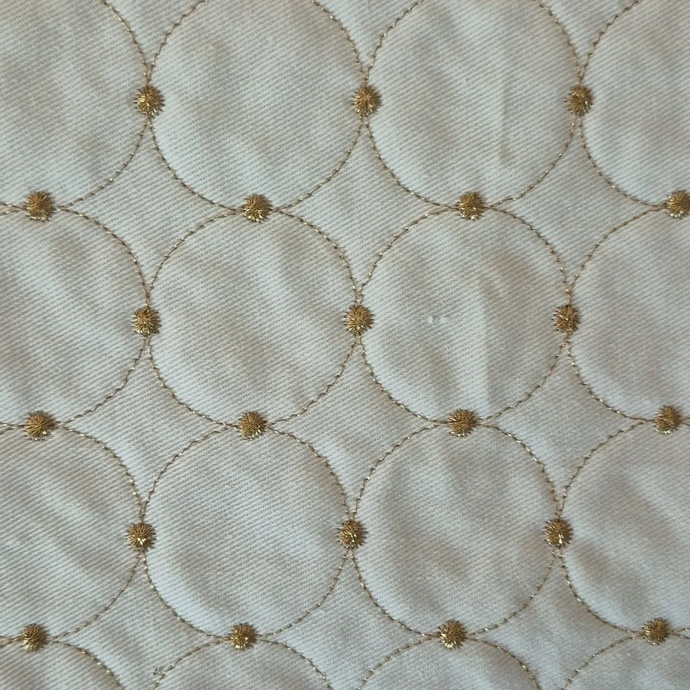 4 Martha Stewart gold sparkle and cream placemats. New from 2008